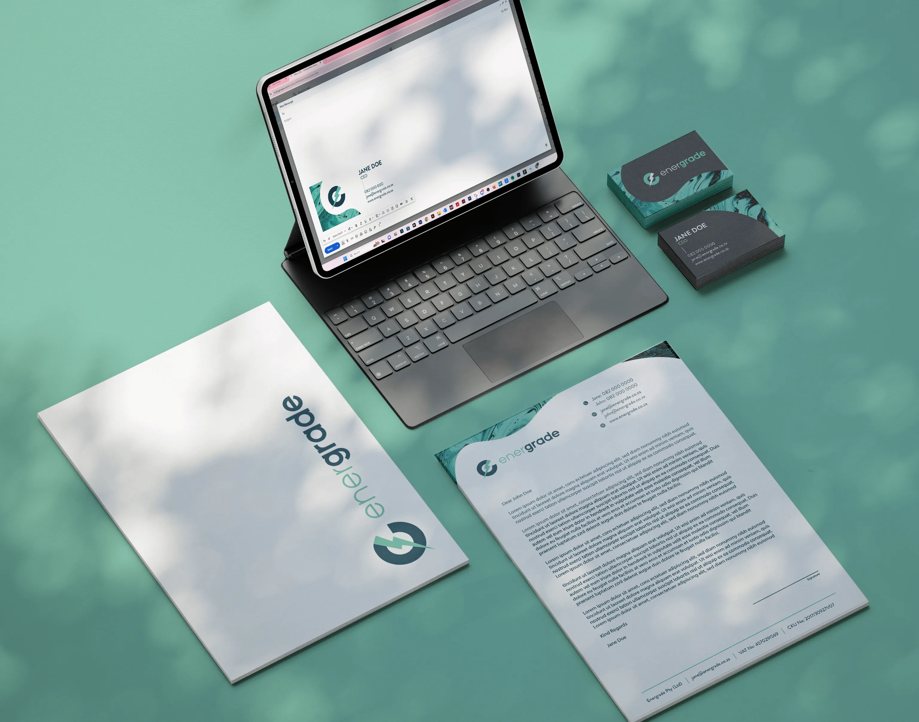 Mock up of business folder, letterhead, business card and email signature for Energrade.