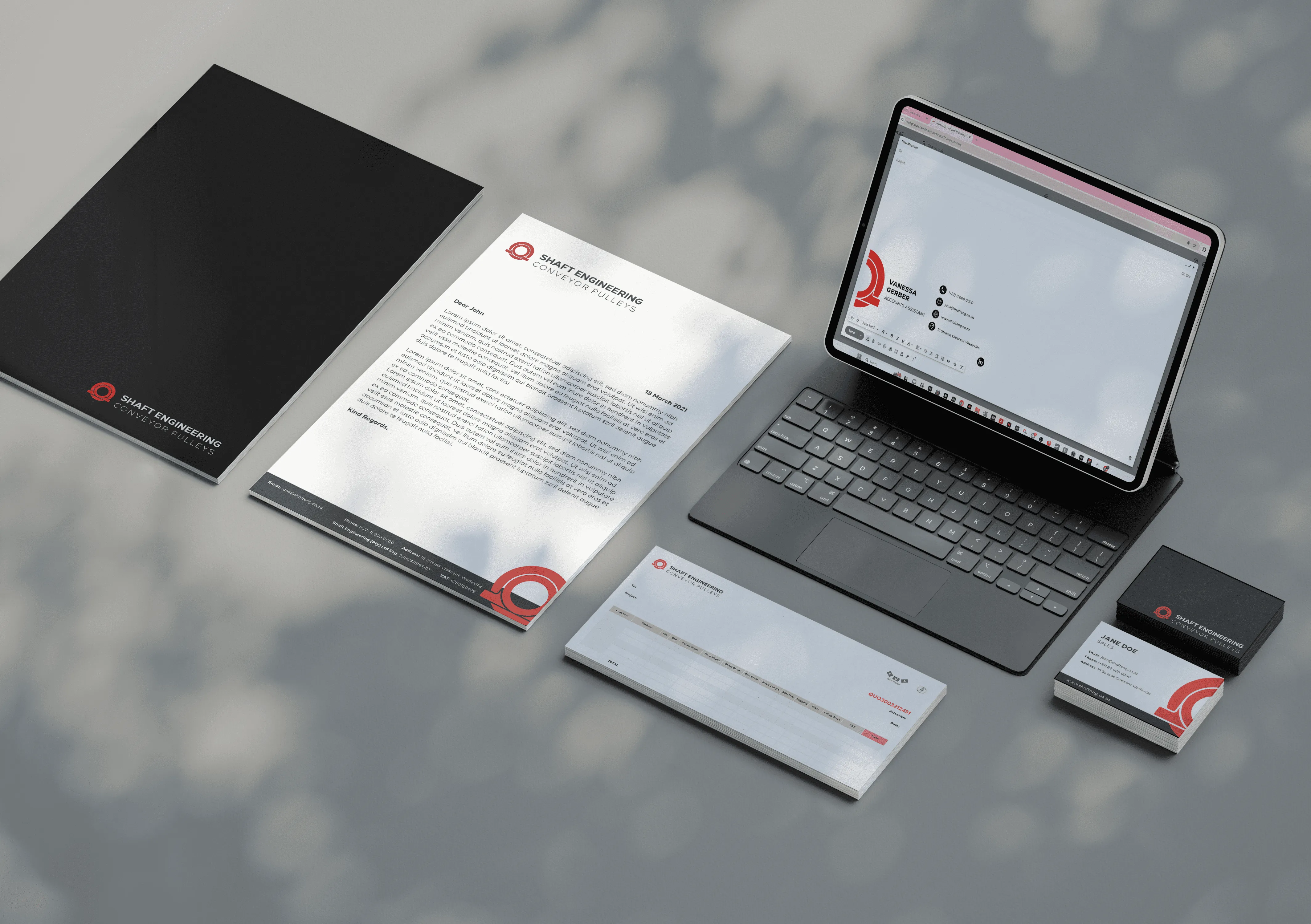 Mock up of business folder, letterhead, business card and email signature for Shaft Engineering.